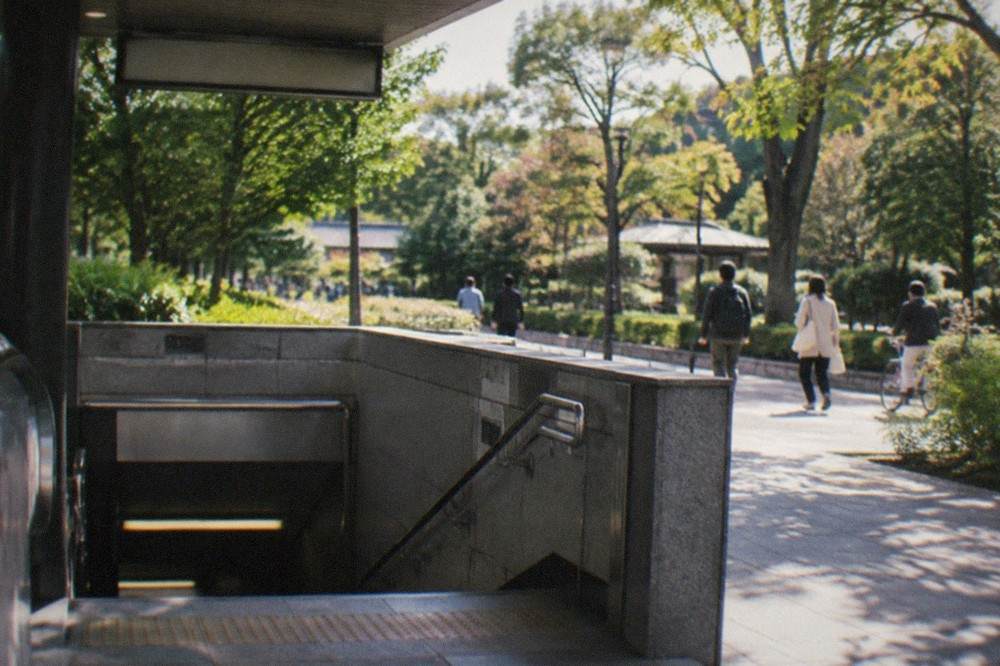 A subway station entrance in Kyoto with a canopy above the doors