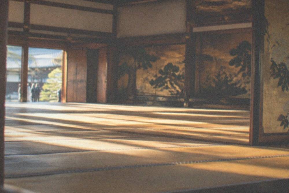 The grand audience hall interior of the Ninomaru Palace with tatami flooring and painted screens