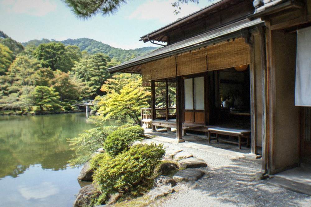 A traditional tea house beside a pond at the middle terrace of the Shugakuin Imperial Villa