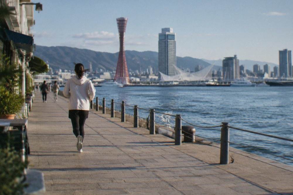 Harbour front skyline of Kobe seen across the water on a clear afternoon