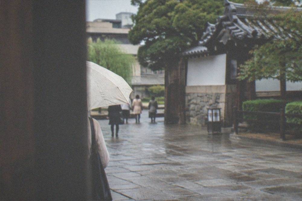 A quiet stone castle courtyard in morning light with wide level paving