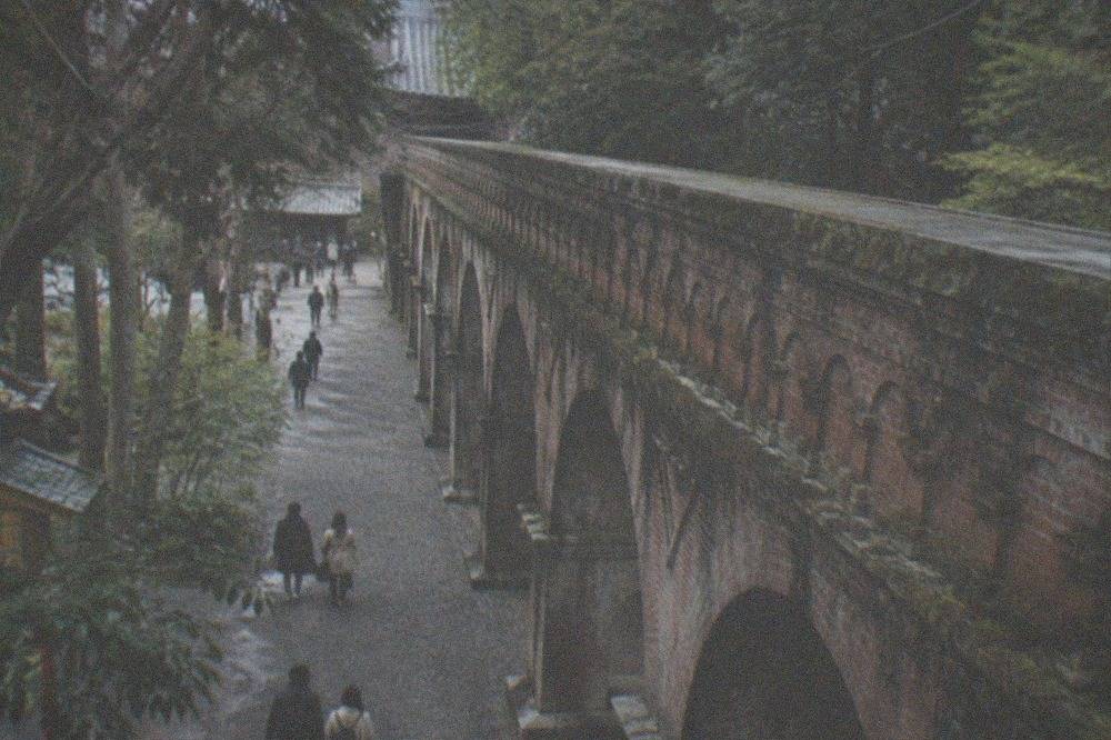 The brick aqueduct inside Nanzen-ji temple grounds surrounded by trees