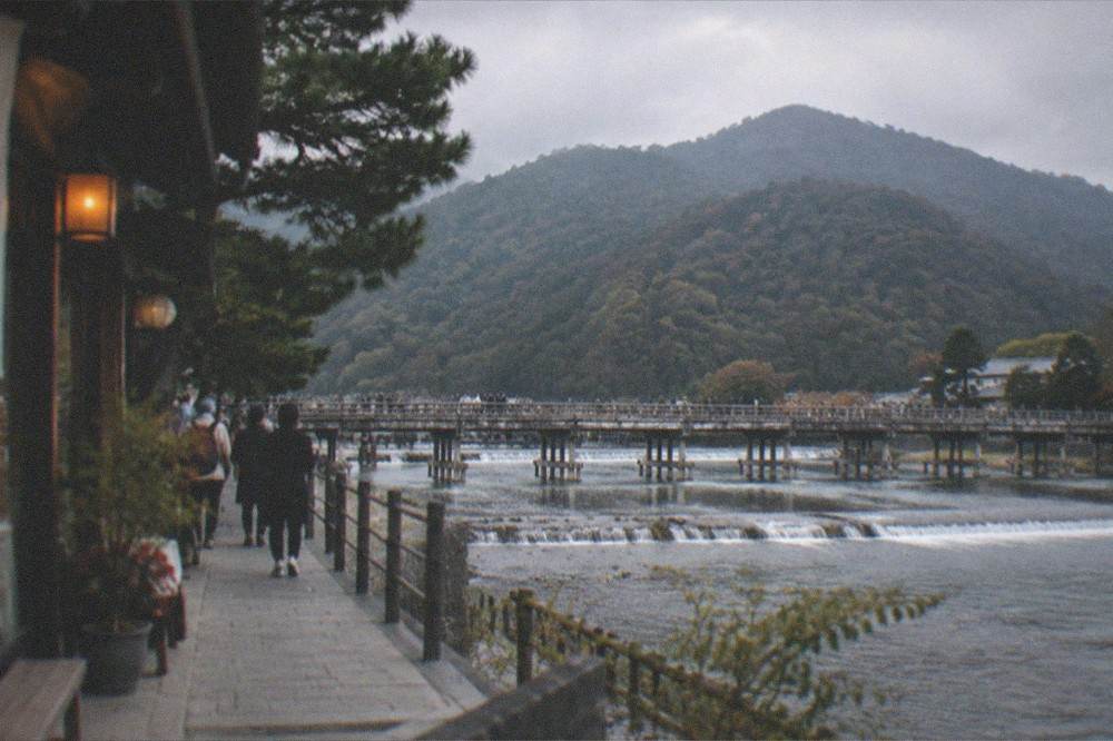 Togetsukyo bridge spanning the Katsura River with Arashiyama mountain behind